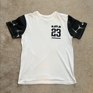 Nike White Short-Sleeve Graphic Tee with Black Patterned Sleeves and 23 Logo